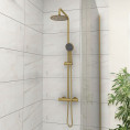 Arc Cool Touch Thermostatic Bar Shower Valve With Fixed Head & Riser Rail Kit Brushed Brass Roomset